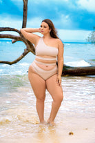 CT Lingerie cora shimmery plus size swimsuit one shoulder beige design with cutouts on the beach