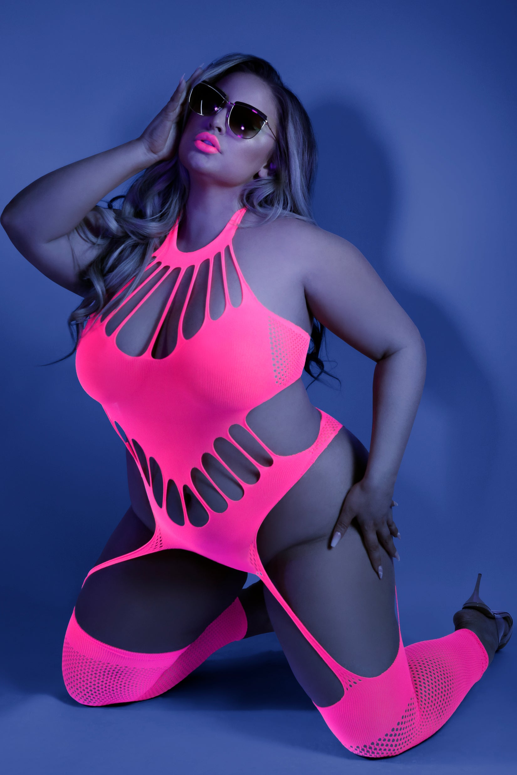 CT Lingerie plus size neon lingerie bodystocking in neon pink cutout design with thigh highs