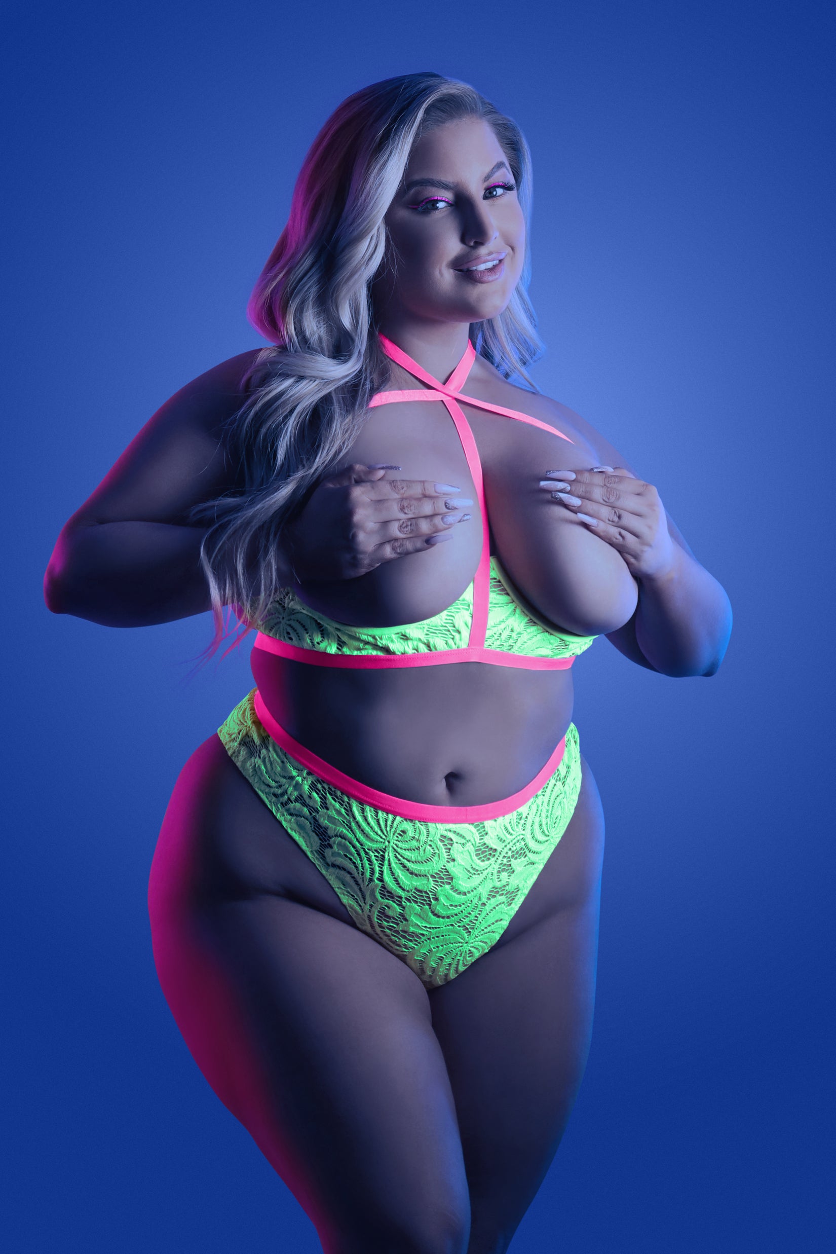 CT Lingerie plus size neon lingerie set neon green lace bra and high cut panties with pink straps on model