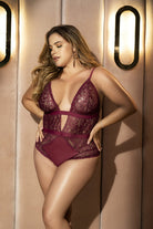 CT Lingerie plus size lace bodysuit in burgundy with sheer panels and adjustable straps on model