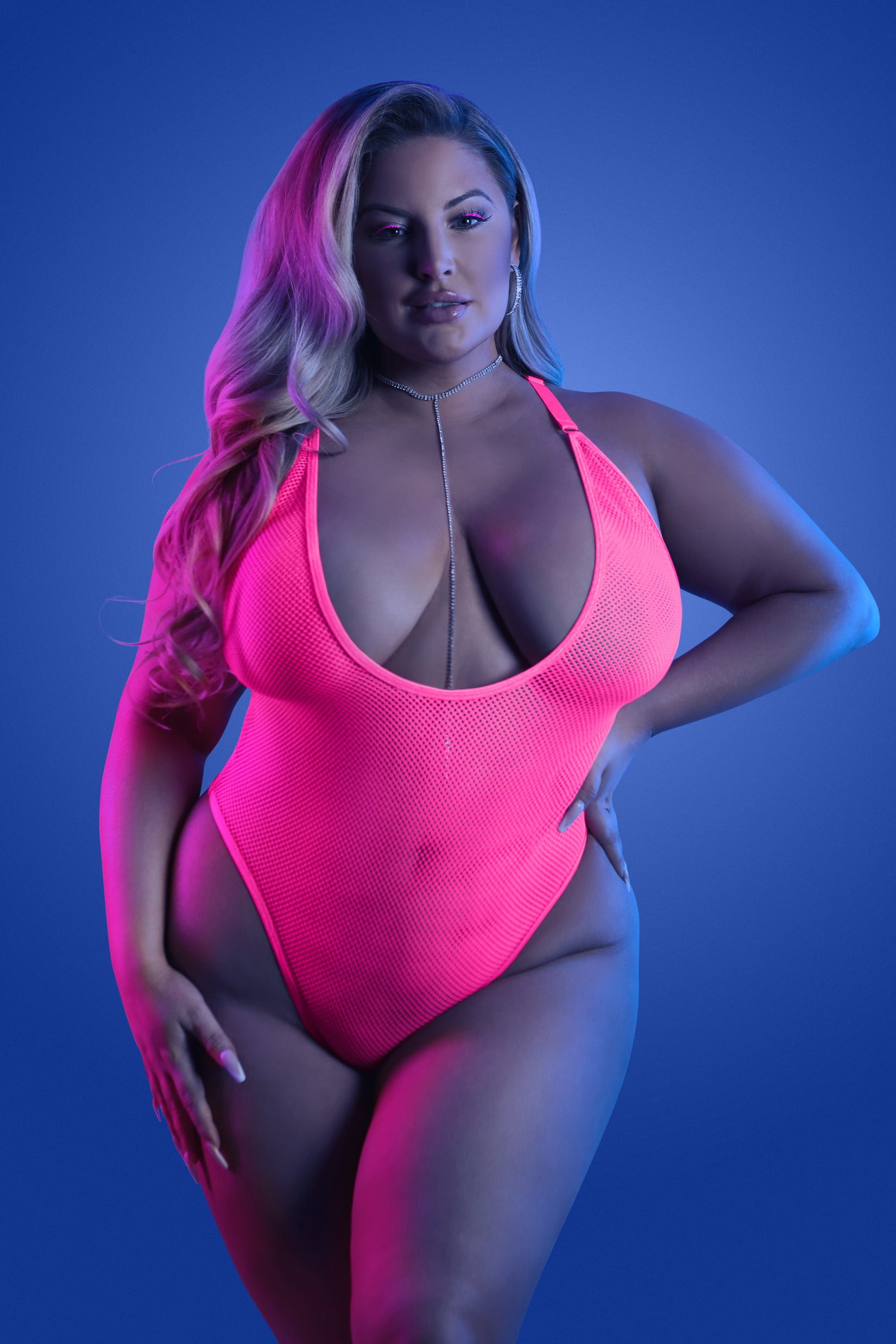 CT Lingerie plus size neon lingerie bodysuit in hot pink with plunging neckline and halter straps