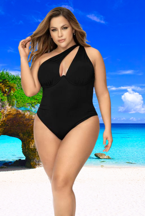 Plus size model wearing CT Lingerie Janie Sexy Black One Piece Swimsuit on a sunny beach with clear blue sky