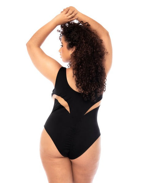 Plus size woman wearing black Passion classic one piece swimsuit  showing back cutout design