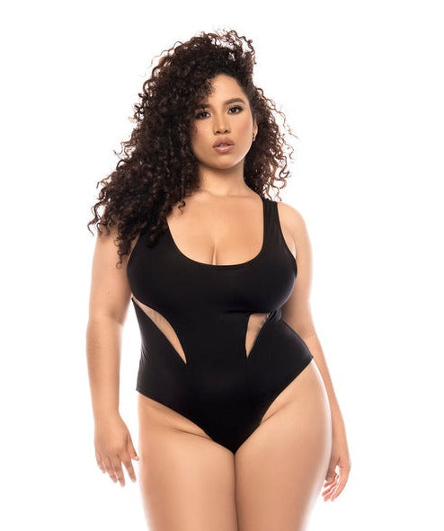 Plus size model wearing Passion classic one piece swimsuit in black with cutout details