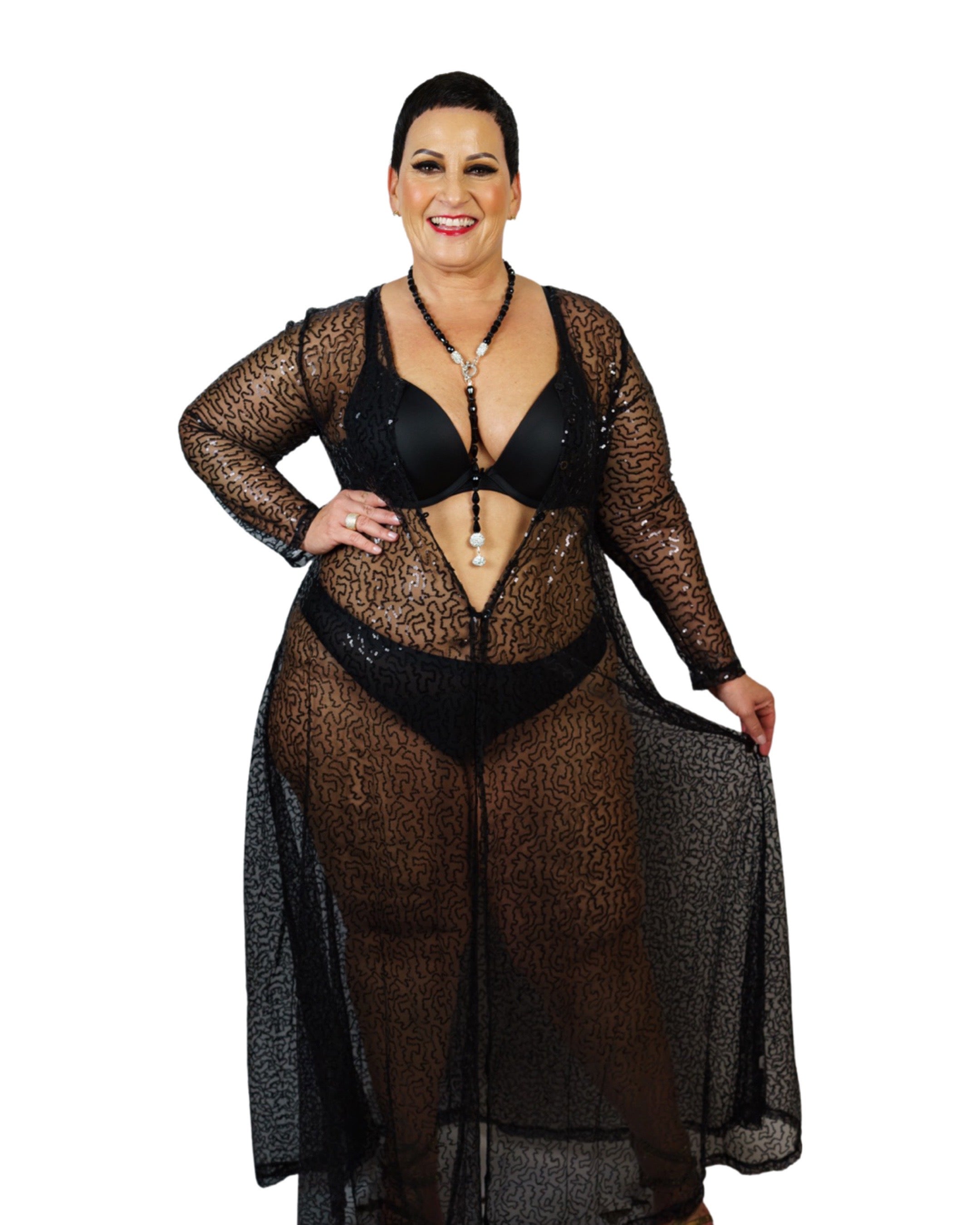 Plus size model wearing CT Lingerie sexy black lace robe sheer floor length long sleeve over black bra and panties