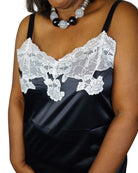 CT Lingerie clearance black satin slip with white lace trim on model wearing necklace sexy plus size lingerie